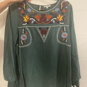 Green top with flowers